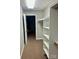 Spacious walk-in closet with custom shelving providing ample storage space at 1700 Pickwick Ave, Kannapolis, NC 28083