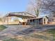 View of the spacious carport and metal building, a potential storage or workshop space at 176 Travis Loop, Statesville, NC 28625