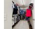 Walk-in closet with ample hanging space and shoe storage at 18522 Victoria Bay Dr, Cornelius, NC 28031