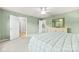 Spacious main bedroom with neutral decor and multiple doorways at 18522 Victoria Bay Dr, Cornelius, NC 28031