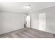 A bedroom with neutral walls, plush carpeting, and white doors at 2007 Sugar Hill Rd, York, SC 29745