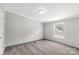 Bright bedroom featuring a window, neutral walls, and plush carpeting at 2007 Sugar Hill Rd, York, SC 29745