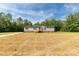 Inviting single-Gathering home with an expansive lawn and new wood porch at 2007 Sugar Hill Rd, York, SC 29745