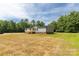 Peaceful single-Gathering home with new porch, surrounded by mature trees and green grass at 2007 Sugar Hill Rd, York, SC 29745
