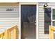 Close up of front door, light fixture, and shutters at 2007 Sugar Hill Rd, York, SC 29745
