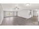 Open-concept living room with gray flooring, great for entertaining guests at 2007 Sugar Hill Rd, York, SC 29745
