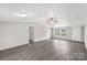 Bright and spacious living room with ceiling fan and gray flooring at 2007 Sugar Hill Rd, York, SC 29745