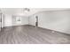 Bright and spacious living room with modern gray flooring at 2007 Sugar Hill Rd, York, SC 29745