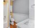 Bathroom featuring a toilet and tub/shower with a sink and vanity at 203 Ewing Dr, Belmont, NC 28012