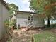 Back of home with a concrete patio, vinyl siding, and a small fenced-in yard at 214 Tenth St, Cramerton, NC 28032