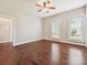 Bedroom featuring hardwood floors, neutral walls, white trim, with great natural light at 214 Tenth St, Cramerton, NC 28032