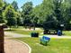 Picturesque park with walking paths, picnic shelters, and swings, offering a peaceful and recreational environment at 214 Tenth St, Cramerton, NC 28032
