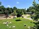 Vibrant playground with climbing structures, slides, and ample seating areas for families to enjoy outdoor activities at 214 Tenth St, Cramerton, NC 28032
