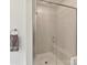Modern bathroom featuring a tiled shower and glass door at 2343 Mt. Harmony Church Rd, Matthews, NC 28104