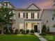 Charming two-story home features a landscaped front yard with lush greenery and a welcoming entrance at 2343 Mt. Harmony Church Rd, Matthews, NC 28104