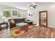Bright living room with modern decor, hardwood floors, and ample natural light at 2343 Mt. Harmony Church Rd, Matthews, NC 28104