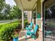 Cozy front porch featuring comfortable seating and a welcoming view of the neighborhood at 2343 Mt. Harmony Church Rd, Matthews, NC 28104
