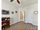 Well-lit spare bedroom with luxury vinyl floors and a ceiling fan at 2343 Mt. Harmony Church Rd, Matthews, NC 28104