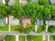 Aerial view showcasing the home's location within a leafy neighborhood, revealing its setting and surrounding properties at 256 Rose St, Mooresville, NC 28117