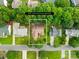 Aerial view of the property showing the layout, landscaping, and surrounding neighborhood at 256 Rose St, Mooresville, NC 28117