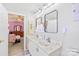 Modern bathroom with double vanity, marble countertops, and stylish fixtures at 256 Rose St, Mooresville, NC 28117