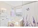 Bright bathroom featuring a soaking tub, neutral tones, and elegant decor at 256 Rose St, Mooresville, NC 28117