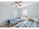 Bright bedroom with twin beds and a window, offering a comfortable and peaceful retreat at 256 Rose St, Mooresville, NC 28117