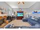 Inviting living room with a cozy fireplace and comfortable furnishings at 256 Rose St, Mooresville, NC 28117