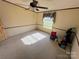 A bedroom with natural light and ample space for furniture at 302 Edwards Rd, Mooresville, NC 28115