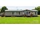 Charming single-story home with a covered front porch, perfect for enjoying the outdoors at 302 Edwards Rd, Mooresville, NC 28115