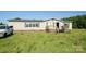 Charming home with green trim, and a small front porch at 302 Edwards Rd, Mooresville, NC 28115