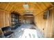 Interior of storage shed with wooden walls and shelves at 302 Edwards Rd, Mooresville, NC 28115