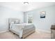Bright, cozy bedroom with carpet, a double bed and a window at 3038 Burnello Ct, Iron Station, NC 28080