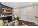 Stylish bar area with a sleek design, featuring a display of liquors and comfortable seating at 318 N Dotger Ave, Charlotte, NC 28204