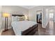 Comfortable bedroom with a view to the closet and wood flooring at 318 N Dotger Ave, Charlotte, NC 28204