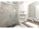 Updated bathroom featuring glass shower, granite vanity, and stylish tile at 3604 Golfview Dr, Gastonia, NC 28056