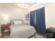 Calm bedroom includes a metal bed frame, plush pillows, and natural light at 3604 Golfview Dr, Gastonia, NC 28056