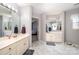 Elegant bathroom with dual sinks, vanity, and ample counter space and cabinets at 3810 Yorkford Dr, Charlotte, NC 28269