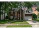 Charming brick home featuring a well-manicured lawn and a two-car garage at 3810 Yorkford Dr, Charlotte, NC 28269