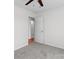 Bright bedroom with gray carpet, neutral walls, and a ceiling fan at 4111 Alexis Sw Ct, Concord, NC 28027