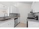Modern kitchen featuring granite countertops and stainless steel appliances at 4111 Alexis Sw Ct, Concord, NC 28027