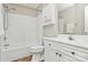 This well-lit bathroom has a shower-tub combo and a vanity at 4263 Melrose Club Dr, Matthews, NC 28105