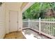 Enclosed patio with white picket fence and exterior closet featuring a private outdoor retreat at 4263 Melrose Club Dr, Matthews, NC 28105