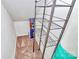 Unfinished storage room with a metal storage rack and carpeted floor at 4263 Melrose Club Dr, Matthews, NC 28105