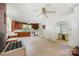 Functional kitchen area featuring classic wood cabinetry, laminate flooring, and an open layout, offering potential for customization at 4612 Rehobeth Rd, Waxhaw, NC 28173