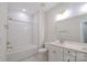Bathroom featuring a shower-tub combo, white subway tile and a double vanity at 4714 Blanchard Way, Charlotte, NC 28226