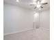 Simple bedroom with neutral carpet, ceiling fan, and minimalist design at 4714 Blanchard Way, Charlotte, NC 28226