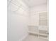 Well-organized walk-in closet with white shelving and ample storage space at 4714 Blanchard Way, Charlotte, NC 28226