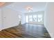 Bright living room with wood flooring, many windows and an open layout at 4714 Blanchard Way, Charlotte, NC 28226