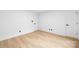 Bright bedroom featuring LVP flooring, white walls, and white trim at 4808 Cobble Glen Way, Charlotte, NC 28269